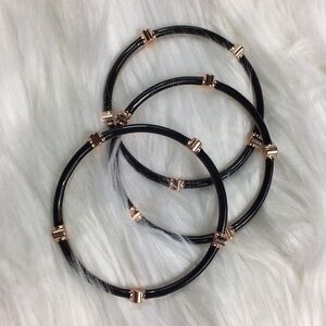 9” black enamel/gold tone/sparking stone bracelet.